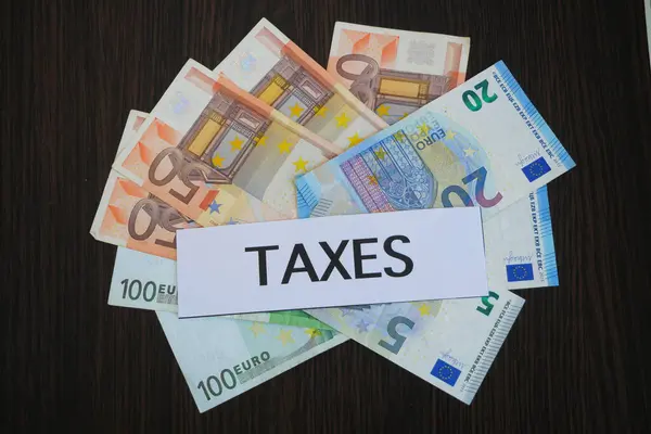 Inscription Paper Taxes Lies Top Large Pile Euro Cash Money — Stock Photo, Image