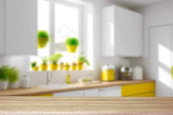 Kitchen table top for product display with blurred modern interior, Empty wooden table top and blur bokeh modern kitchen background, Ready for product montage, Closeup