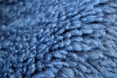 Köknar mahr yün kumaşının ayrıntıları. Tekstil arka planı. Yünlü doku arka planı, örgü yün kumaş, tüylü yumuşacık tekstil. Yakın çekim.