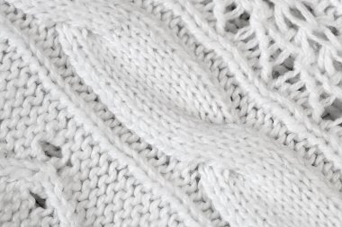 Örgü yün kumaşın ayrıntıları. Beyaz tekstil arka planı. Yün Doku Arkaplanı, Örgü Yün Kumaş, Kıllı Tekstil