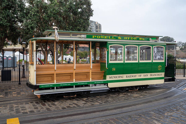 San Francisco, CA, USA - November 05, 2022 - San Francisco's famous cable car for the Powell and Market line at Fisherman's wharf.