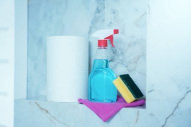Cleaning and polish spray in bathroom at home. Housekeeping and cleaning servic