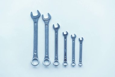 Wrenches on white background in different sizes. Equipment too