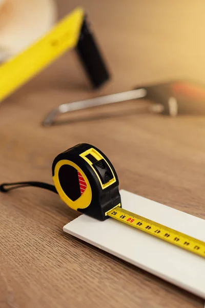 Closeup Blade Square Tape Measure Wooden Backgroun Royalty Free Stock Images