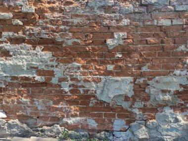 Eski tuğla dokusu. Tasarım için kuru sıkı. Çatlak tuğla.