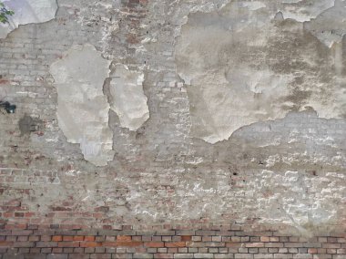 Çatlamış eski bir duvarın dokusu. Gri eski duvar. Kaba doku