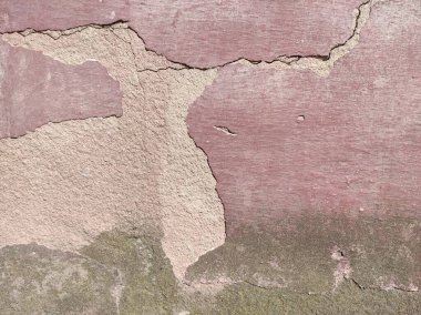 Çatlamış eski bir duvarın dokusu. Gri eski duvar. Kaba doku