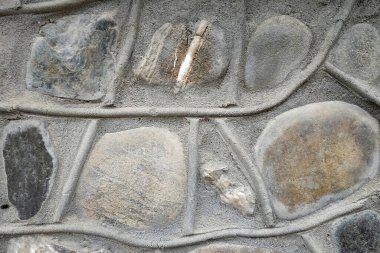 Doğal taş dokusunun fotoğrafı. Duvarın dokusu doğal taştan yapılmış.