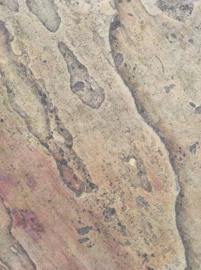 Doğal taş dokusunun fotoğrafı. Duvarın dokusu doğal taştan yapılmış.