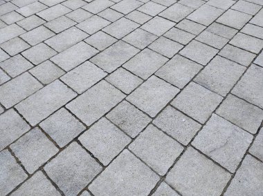 Çakıl taşı dokusu. Kapıda gri kaldırım taşları var. Tasarım boş