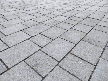 Çakıl taşı dokusu. Kapıda gri kaldırım taşları var. Tasarım boş