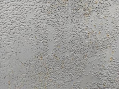 Paslı bir dokunun fotoğrafı. Eski paslı, yıpranmış metal