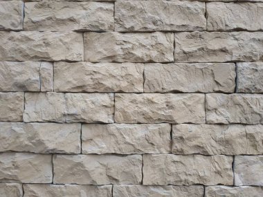 Doğal taş dokusunun fotoğrafı. Duvarın dokusu doğal taştan yapılmış.