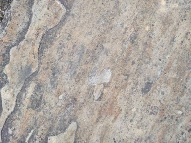 Doğal taş dokusunun fotoğrafı. Duvarın dokusu doğal taştan yapılmış.