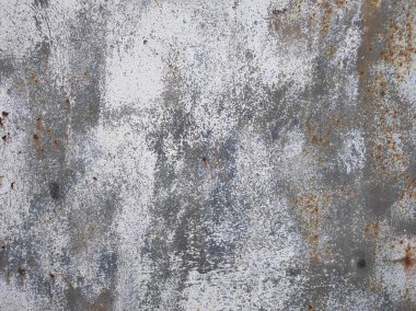 Paslı bir dokunun fotoğrafı. Eski paslı, yıpranmış metal