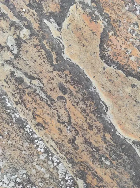 Doğal taş dokusunun fotoğrafı. Duvarın dokusu doğal taştan yapılmış.