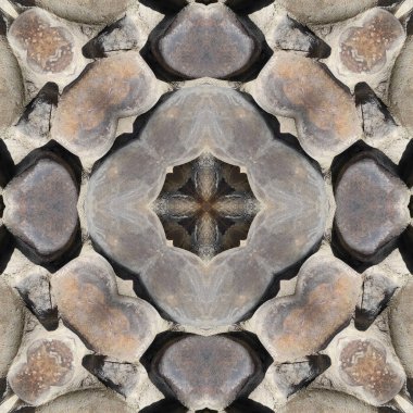 Doğal taşın kusursuz mozaiği. Doğal taşın dokusu. Mozaik kaleydoskop gri ve sarı