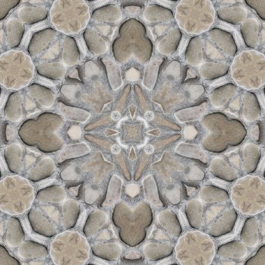 Doğal yuvarlak taşın kusursuz deseni. Doğal taşın gri dokusu. Mozaik kaleydoskop gri mineral.