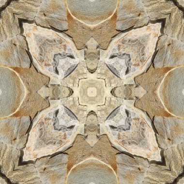 Doğal kayanın kusursuz deseni. Doğal taşın sarı ve gri dokusu. Taştan mozaik kaleydoskop