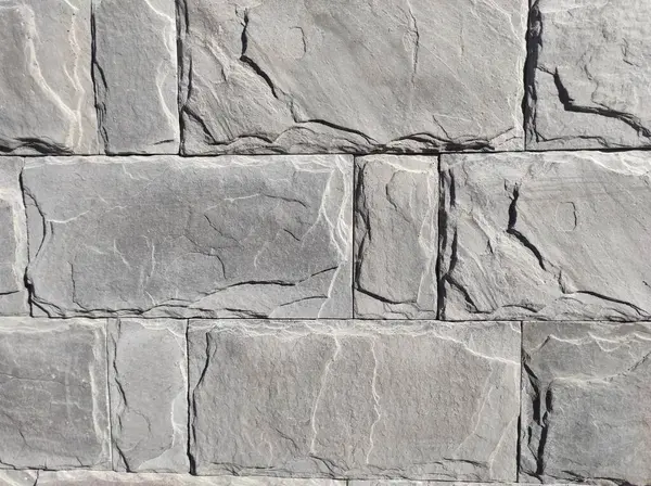 Gri duvar dokusu. Tuğla ve taş duvar. Gri duvar