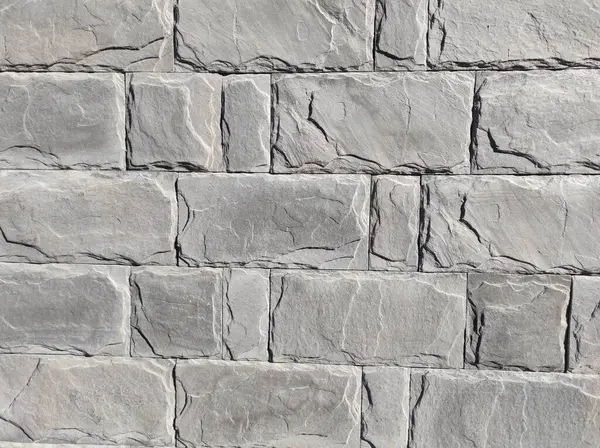 Gri duvar dokusu. Tuğla ve taş duvar. Gri duvar
