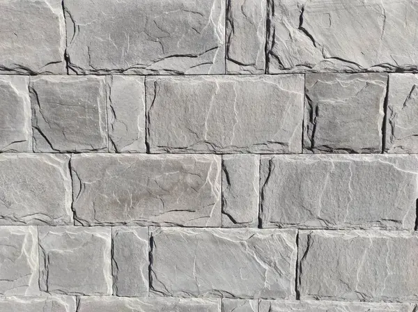 Gri duvar dokusu. Tuğla ve taş duvar. Gri duvar