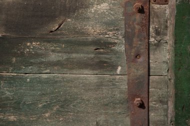 Eski tahtaların fotoğraf dokusu. Tahta dokusu. Tasarım geçmişi. Yeşil soyulmuş tahtalar. Eski doku fotoğrafı