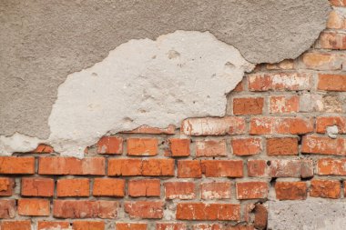 Eski bir tuğla duvarın dokusu. Eski bir tuğla duvarın fotoğrafı. Tuğla dokusu