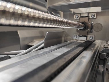 Mekanizma dokusu. Paslanmaz çelik mekanizması. Üretim. Endüstriyel makineler. Endüstri. Sanat modern