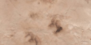 Afiş geniş. Yaşlı papirüsün dokusu. Eski kağıt. Yanmış sarı eski kağıt. Tarihi bir geçmiş. Eski model