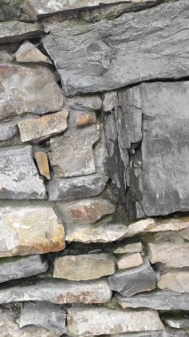 Taş dokusu. Dikey 16x9. Doğal taşın fotoğrafı. Doğal taş.