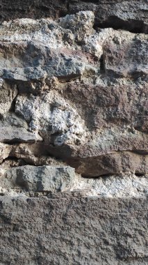 Taş dokusu. Dikey 16x9. Doğal taşın fotoğrafı. Doğal taş.