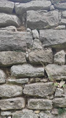 Taş dokusu. Dikey 16x9. Doğal taşın fotoğrafı. Doğal taş.