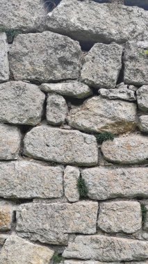 Taş dokusu. Dikey 16x9. Doğal taşın fotoğrafı. Doğal taş.