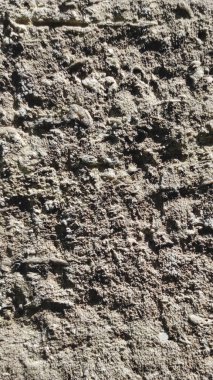 Taş dokusu. Dikey 16x9. Doğal taşın fotoğrafı. Doğal taş.