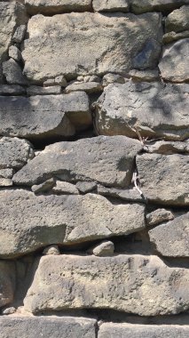 Taş dokusu. Dikey 16x9. Doğal taşın fotoğrafı. Doğal taş.