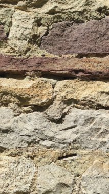 Taş dokusu. Dikey 16x9. Doğal taşın fotoğrafı. Doğal taş.