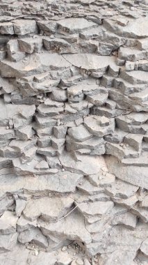 Taş dokusu. Dikey 16x9. Doğal taşın fotoğrafı. Doğal taş.