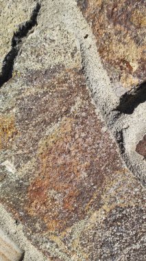 Taş dokusu. Dikey 16x9. Doğal taşın fotoğrafı. Doğal taş.