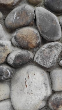 Taş dokusu. Dikey 16x9. Doğal taşın fotoğrafı. Doğal taş.