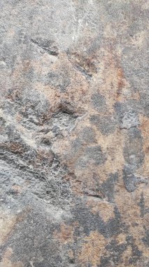 Taş dokusu. Dikey 16x9. Doğal taşın fotoğrafı. Doğal taş.