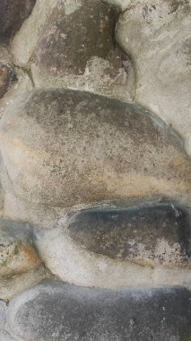 Taş dokusu. Dikey 16x9. Doğal taşın fotoğrafı. Doğal taş.