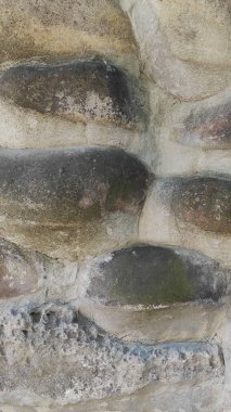 Taş dokusu. Dikey 16x9. Doğal taşın fotoğrafı. Doğal taş.