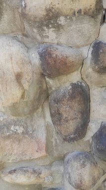 Taş dokusu. Dikey 16x9. Doğal taşın fotoğrafı. Doğal taş.