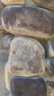 Taş dokusu. Dikey 16x9. Doğal taşın fotoğrafı. Doğal taş.