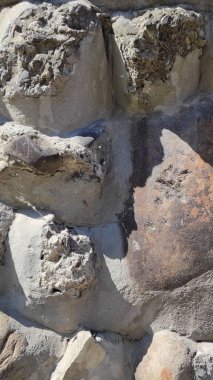 Taş dokusu. Dikey 16x9. Doğal taşın fotoğrafı. Doğal taş.