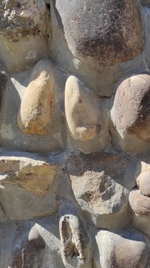 Taş dokusu. Dikey 16x9. Doğal taşın fotoğrafı. Doğal taş.