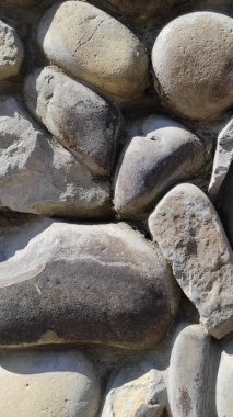 Taş dokusu. Dikey 16x9. Doğal taşın fotoğrafı. Doğal taş.