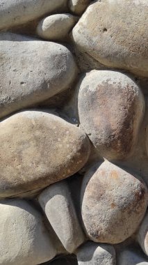 Taş dokusu. Dikey 16x9. Doğal taşın fotoğrafı. Doğal taş.