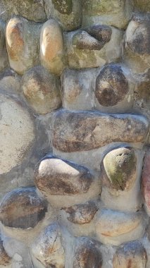 Taş dokusu. Dikey 16x9. Doğal taşın fotoğrafı. Doğal taş.